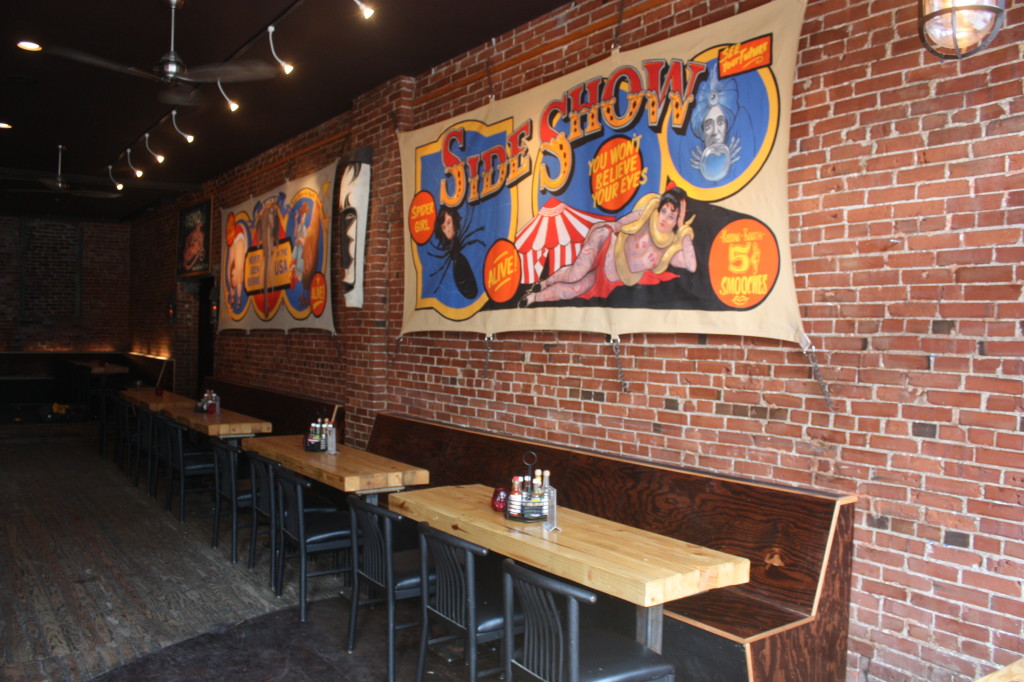 New booths and tables were added to dining areas, along with vibrant wall art. 